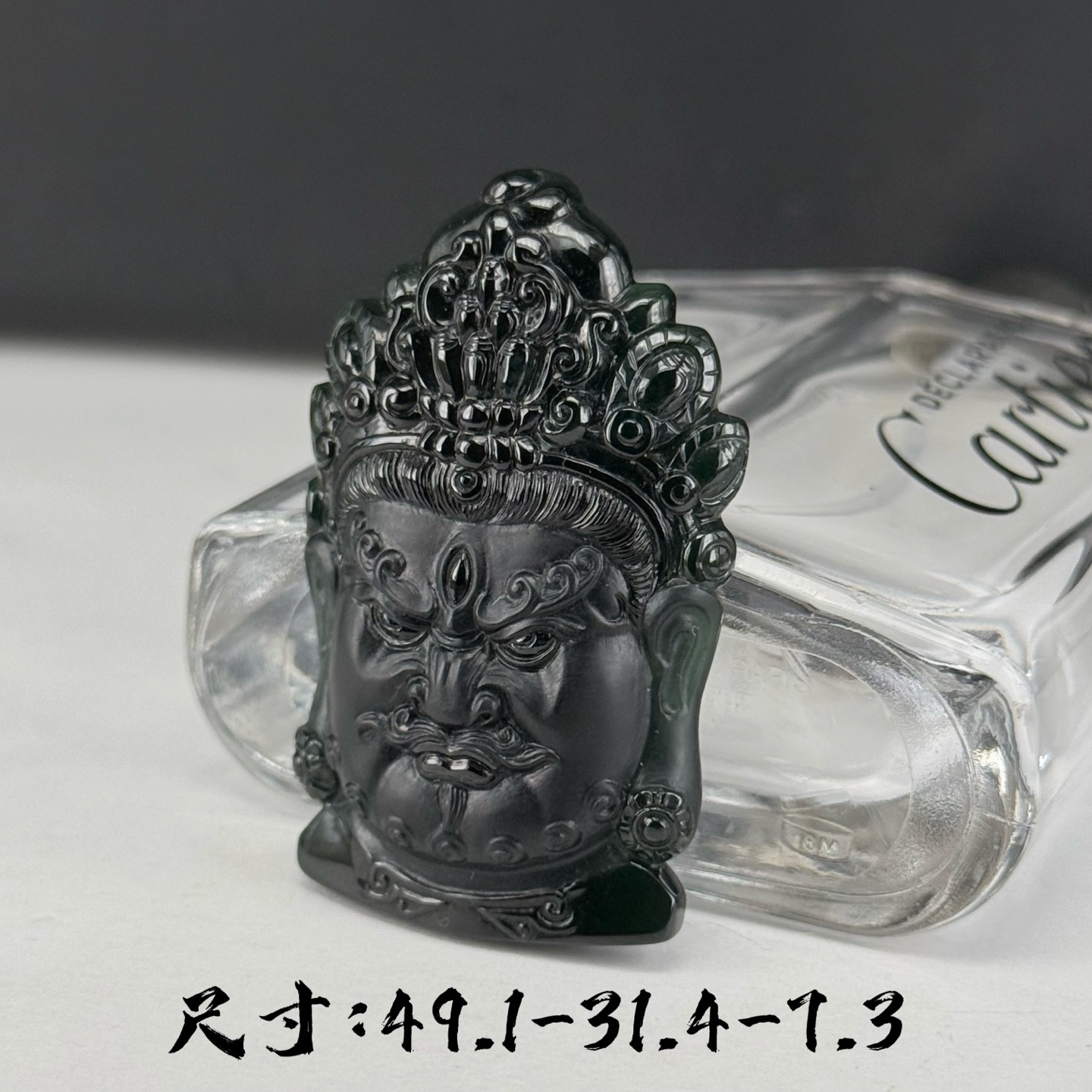精品墨翠不动明王菩萨头雕 种好色正 黑度极好 打灯通透 油性十足 尺寸49.1