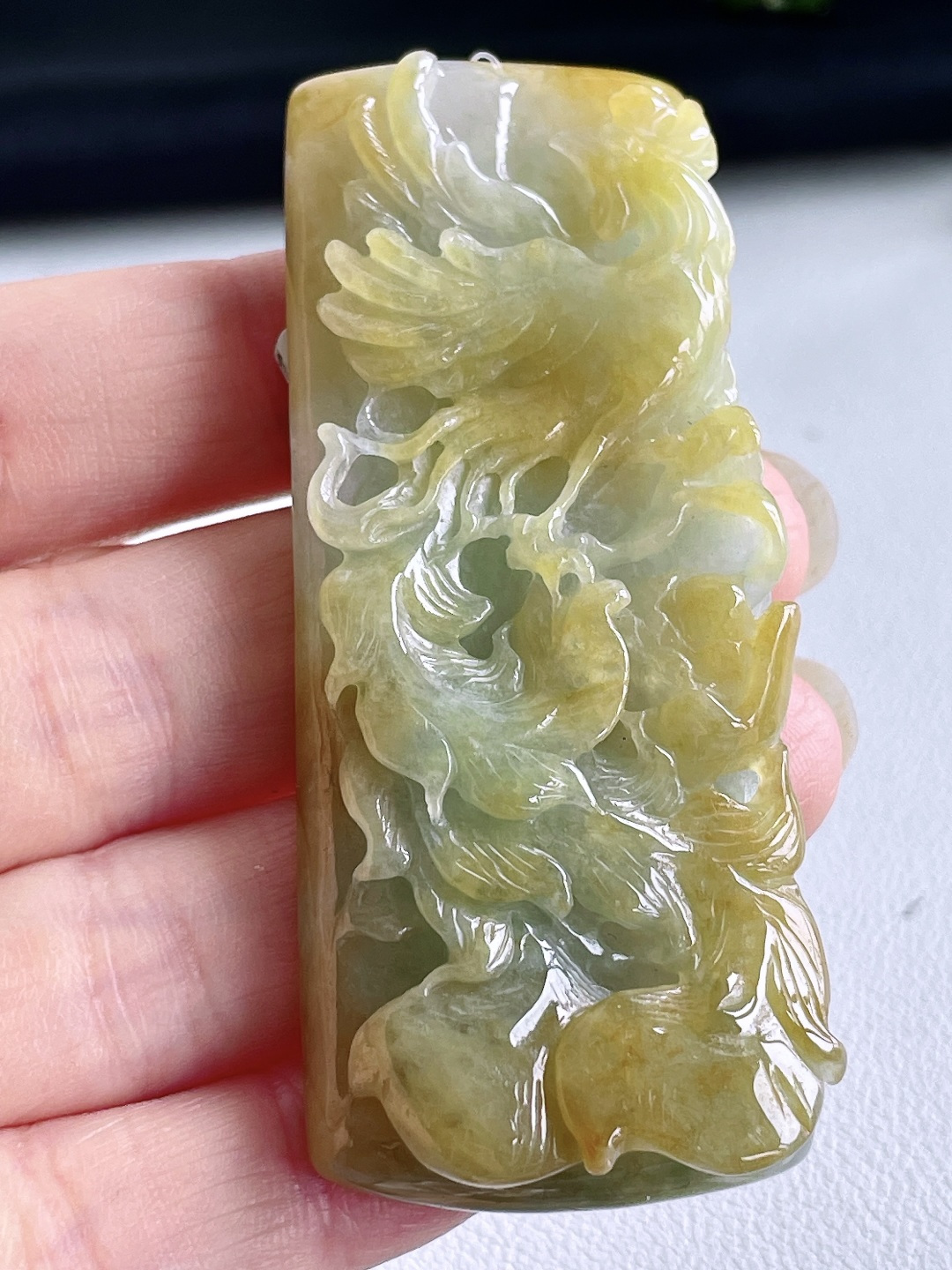 冰飘黄翡凤凰牌吊坠 说明 缅料 性比高 尺寸 72-29.6-11.7 重量 50克 1400不议