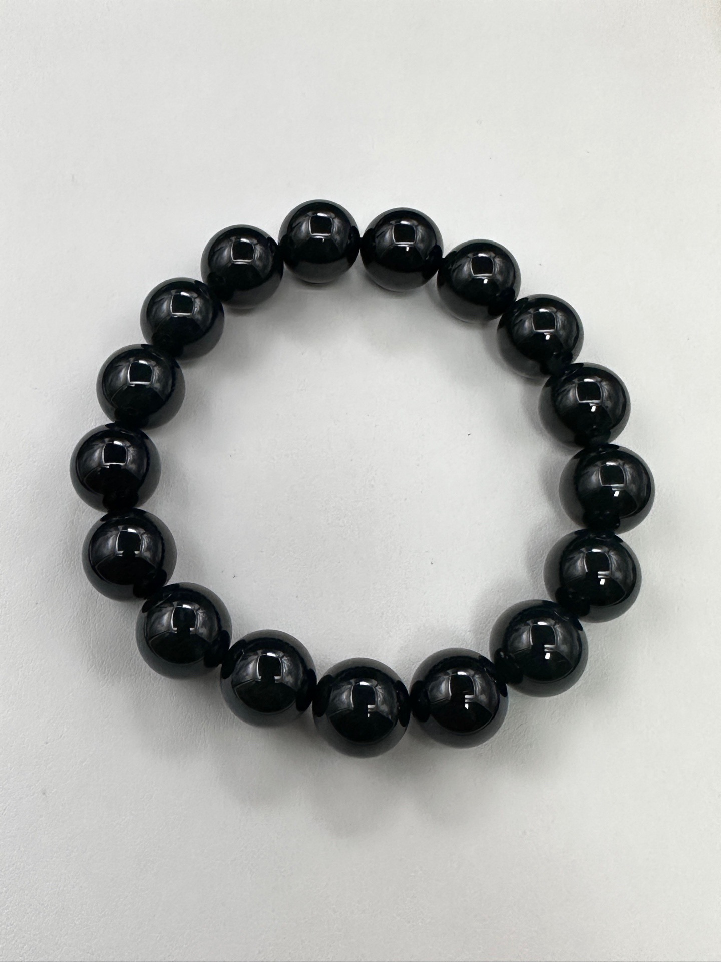：【墨翠手串12mm+】老坑高冰   黑度好  灯照全透  呈帝王绿  种老起光   底极细腻  圆润饱满