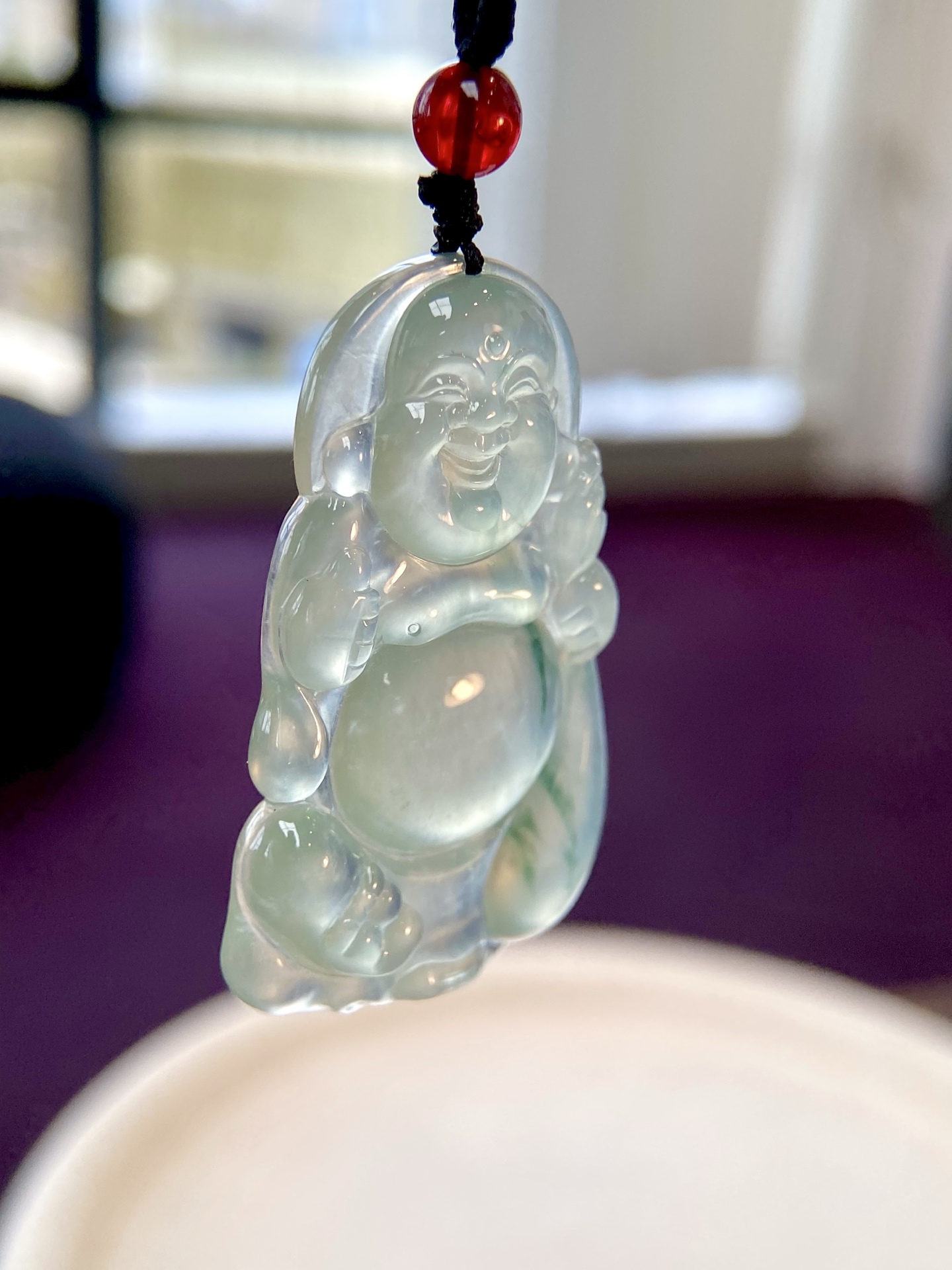 高冰种飘花布袋佛吊坠，胶胶润润的，一抹飘色增添灵韵，憨态可掬，自在从容 福气自来，裸石：48-29.5-5.5mm，无裂