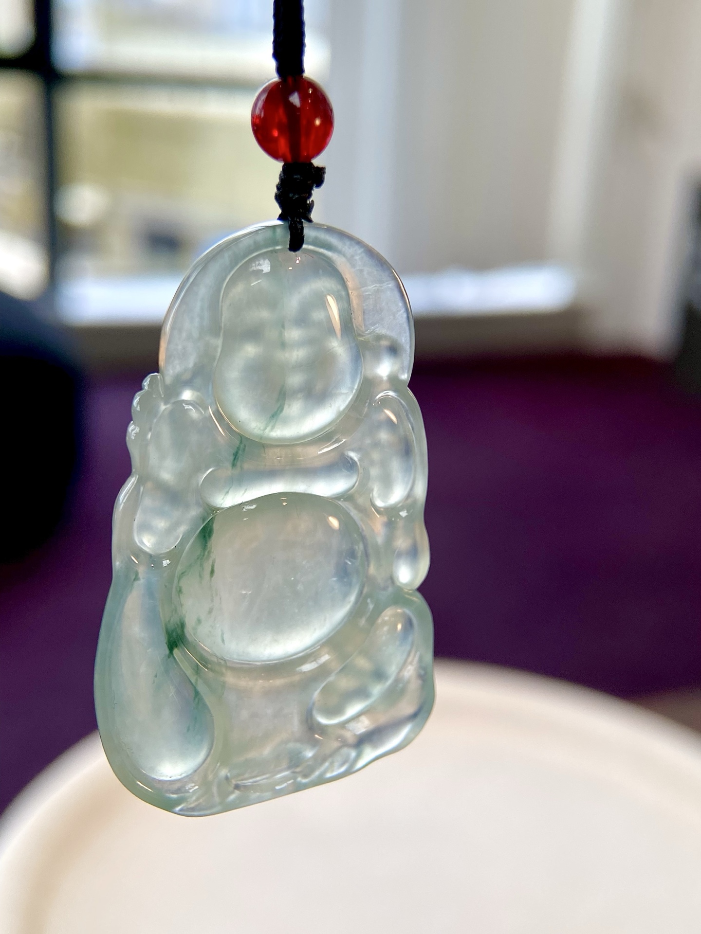 高冰种飘花布袋佛吊坠，胶胶润润的，一抹飘色增添灵韵，憨态可掬，自在从容 福气自来，裸石：48-29.5-5.5mm，无裂