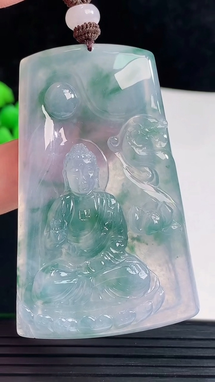 天然A货翡翠种紫罗兰 飘花阿弥陀佛吊坠，尺寸63.5-40-6重量:31.05g
6月3日