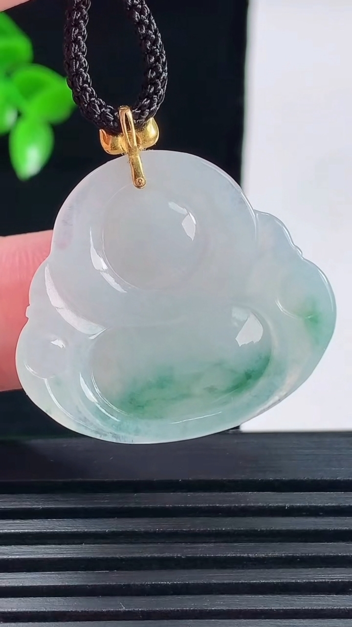 天然A货翡翠种飘花佛公吊坠，尺寸25.5-29-5.6重量:6.63g
6月14日