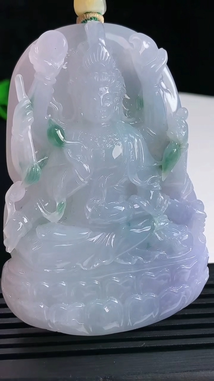 天然A货翡翠双彩紫罗兰 飘花千手观音菩萨吊坠，尺寸70-50-11.5重量:94.32g
6月15日