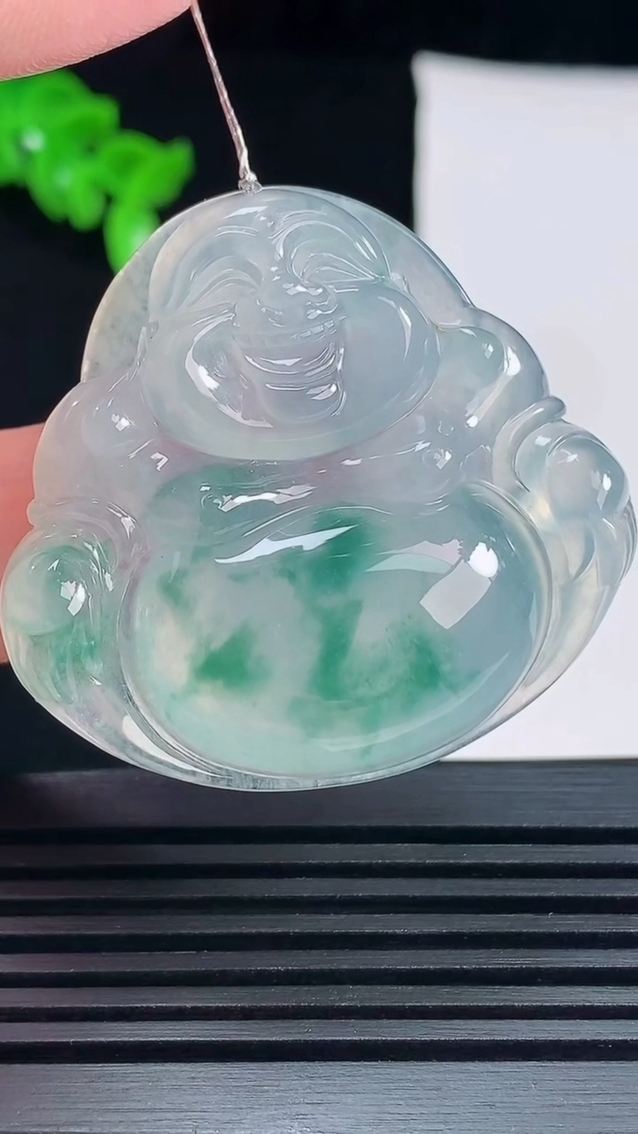 天然A货翡翠种飘花佛公吊坠，尺寸39-42-8 重量:18.79g
6月17日
