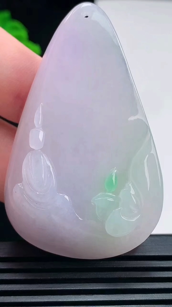 天然A货翡翠春带彩 紫罗兰无相观音吊坠，尺寸60-38-11.5 重量:31.27g
6月26日