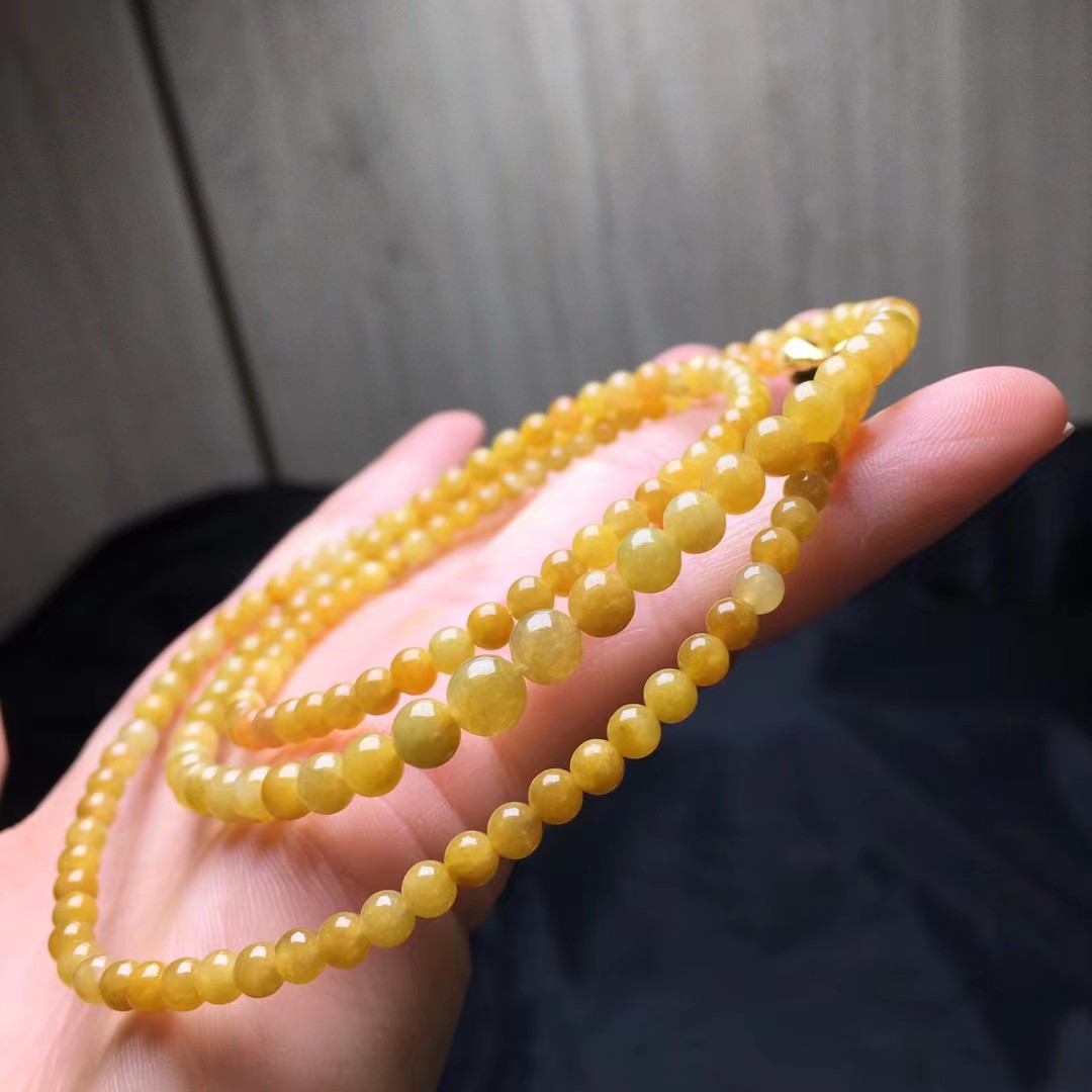 黄翡珠链，卡5.2～3.7mm，170颗，玉质细腻，色浓，鲜艳，油润，颗颗精选