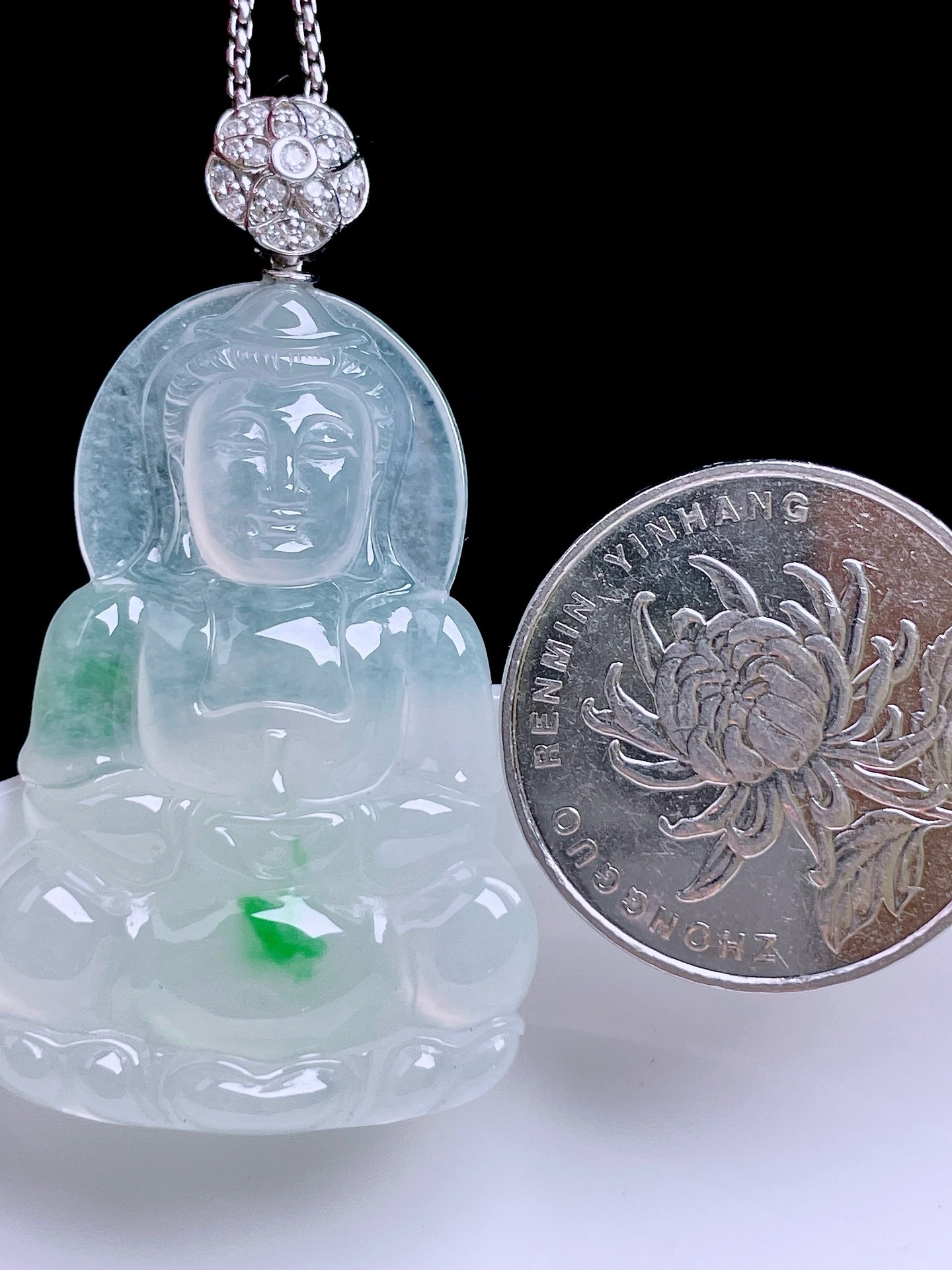 冰飘花观音 飘花灵动，种老水润，18k金镶嵌 整体：49 裸石：39.6/26.2/5.4