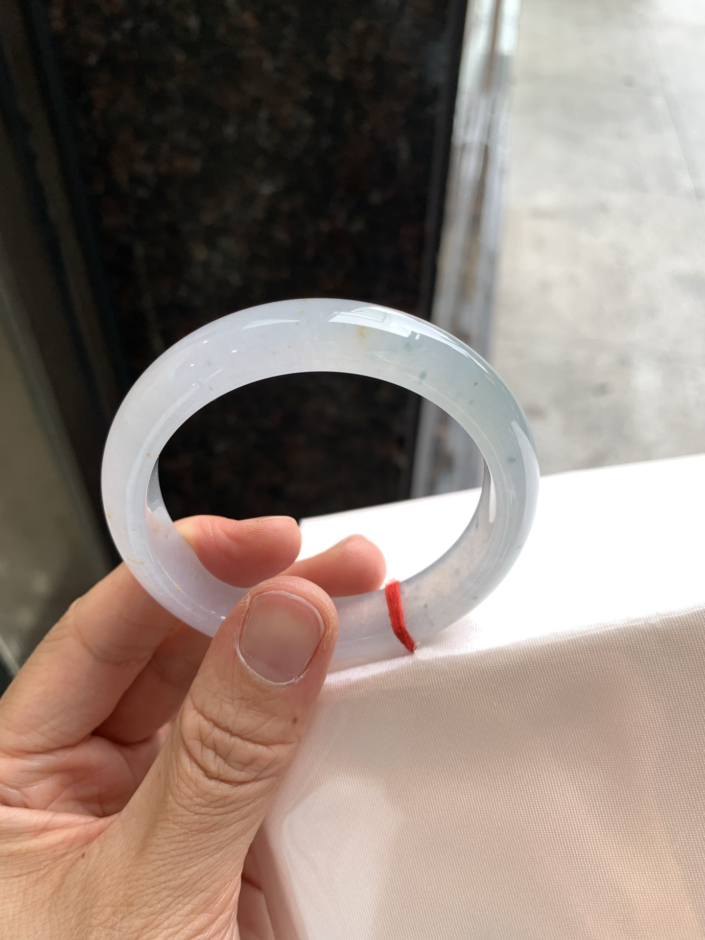 正圈冰黄翡 表皮微瑕疵 尺寸：54.3/12.2/8 冰润