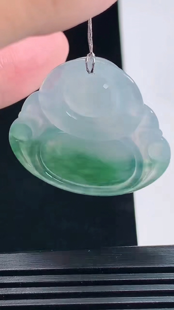 天然A货翡翠冰种飘花佛公吊坠，尺寸31-33.8-5.8 重量:9.05g
7月6日