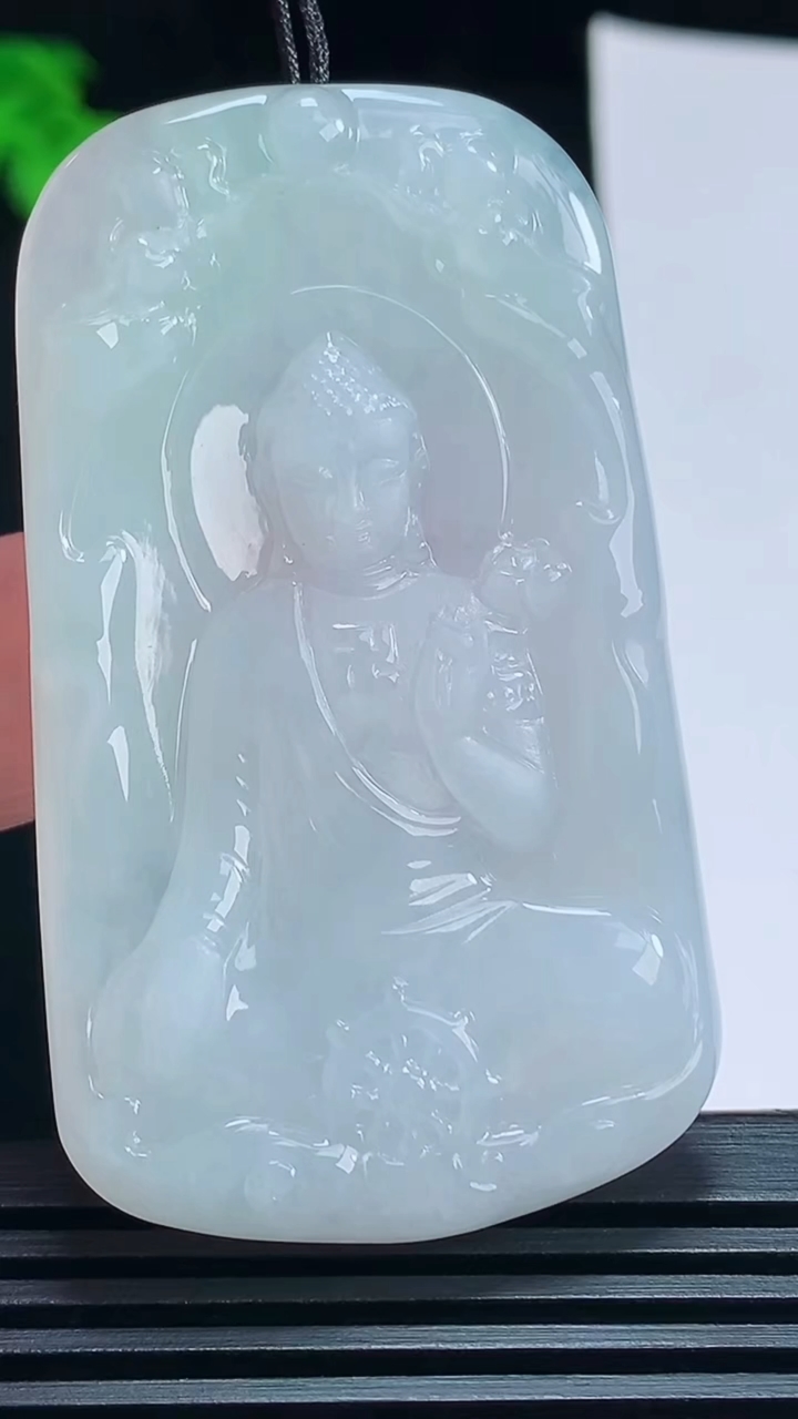 天然A货翡翠阿弥陀佛吊坠，尺寸59.2-35-5.5 重量:26.33g
7月8日