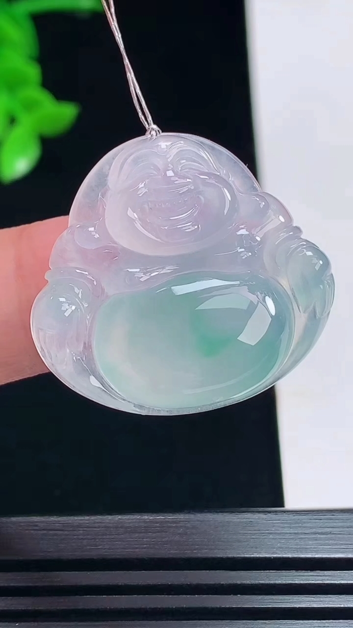 天然A货翡翠种紫罗兰 飘花佛公吊坠，尺寸27-29.6-5.8 重量:7.24g
7月12日