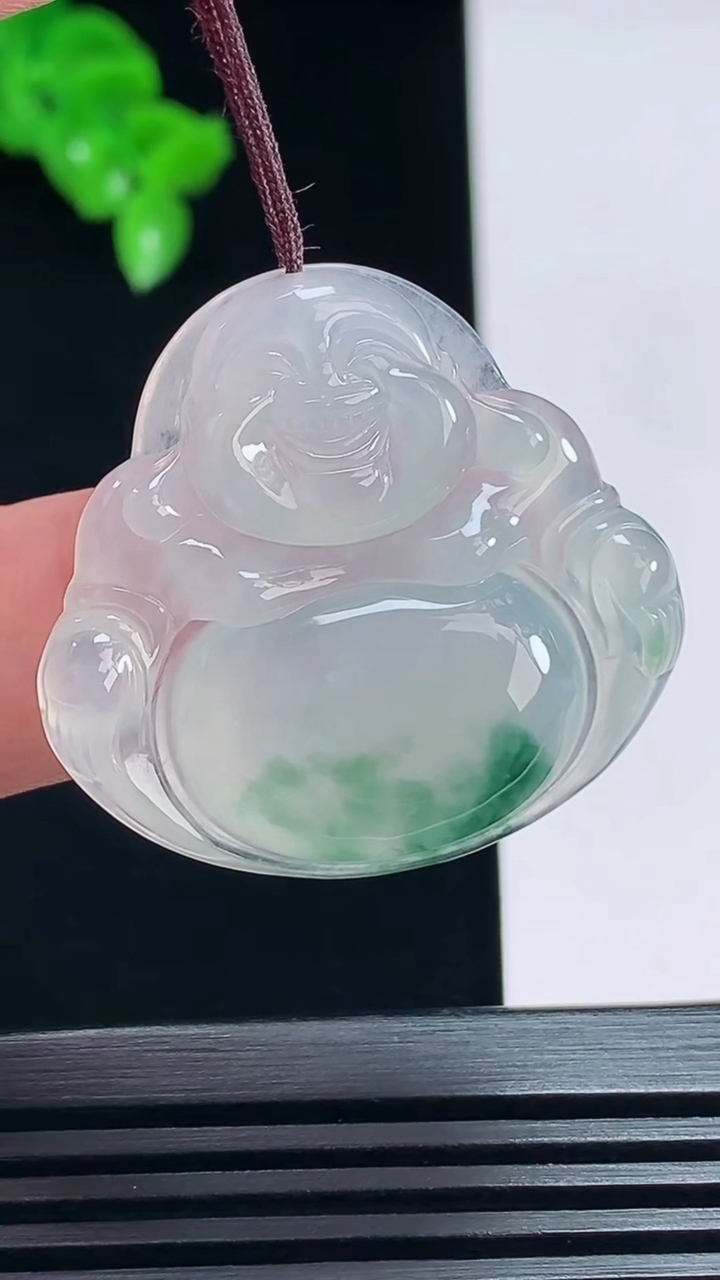 天然A货翡翠种飘花佛公吊坠，尺寸31.5-33.6-5 重量:8.40g
7月12日