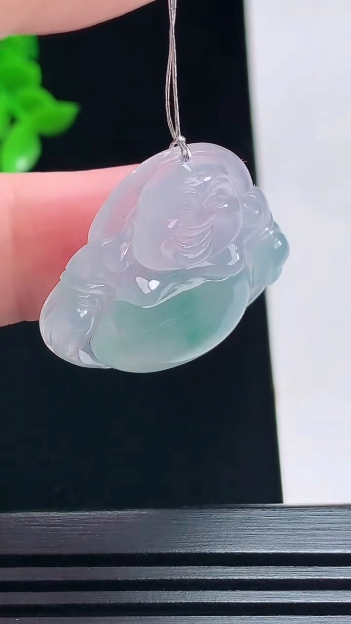 天然A货翡翠种紫罗兰 飘花佛公吊坠，尺寸27-29.6-5.8 重量:7.24g
7月12日