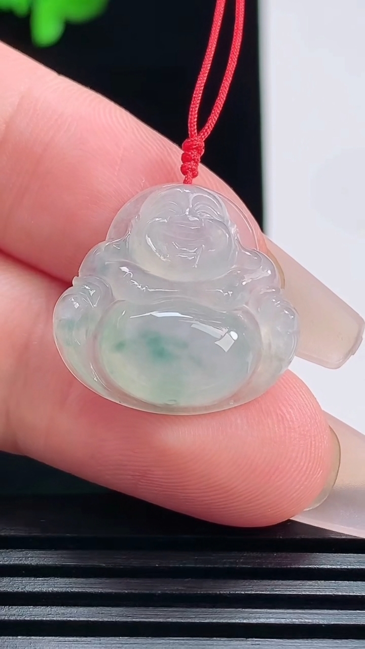 天然A货翡翠飘花佛公吊坠，尺寸20-22-5.6 重量:3.46g
7月19日