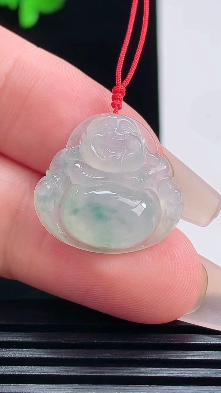 天然A货翡翠飘花佛公吊坠，尺寸20-22-5.6 重量:3.46g
7月19日