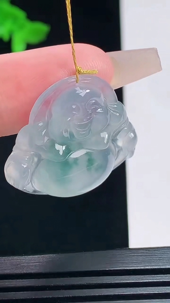 天然A货翡翠种飘花佛公吊坠，尺寸26.5-28-5.5 重量:6.20g
7月19日