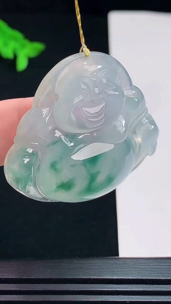 天然A货翡翠种飘花佛公吊坠，尺寸39-41.6-8 重量:18.80g
7月23日