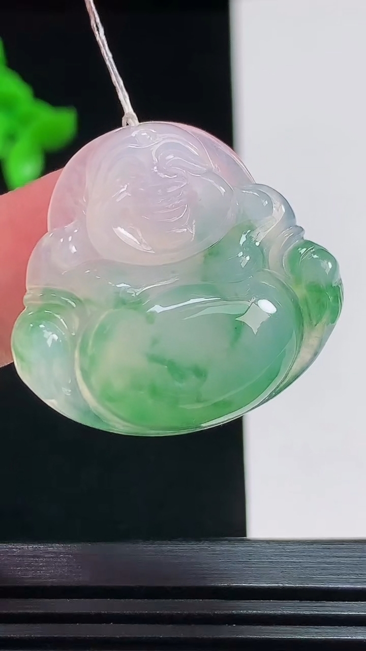 天然A货翡翠种飘花佛公吊坠，尺寸27.5-30-5.6 重量:7.13g
7月26日