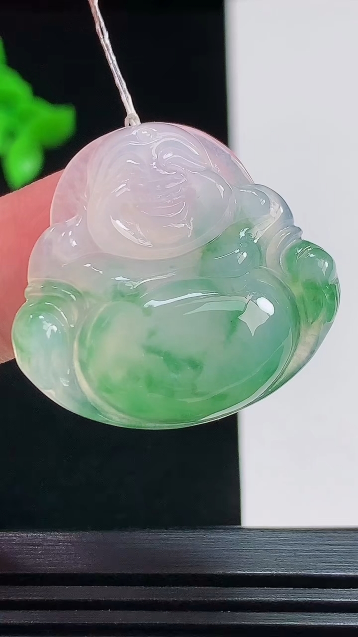 天然A货翡翠种飘花佛公吊坠，尺寸27.5-30-5.6 重量:7.13g
7月26日