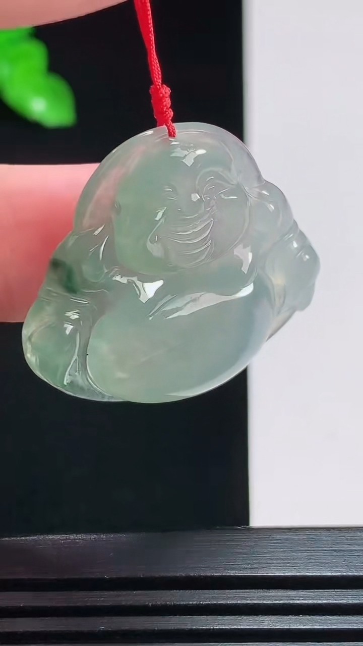 天然A货翡翠飘花佛公吊坠，尺寸29.5-31.5-5.8 重量:8.45g
7月28日