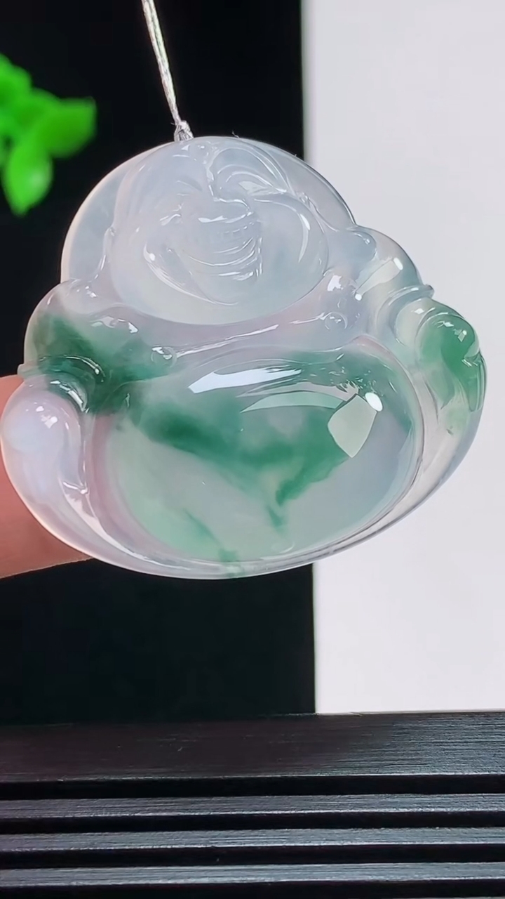 天然A货翡翠种飘花佛公吊坠，尺寸32-35.5-5.8 重量:9.70g
7月29日
