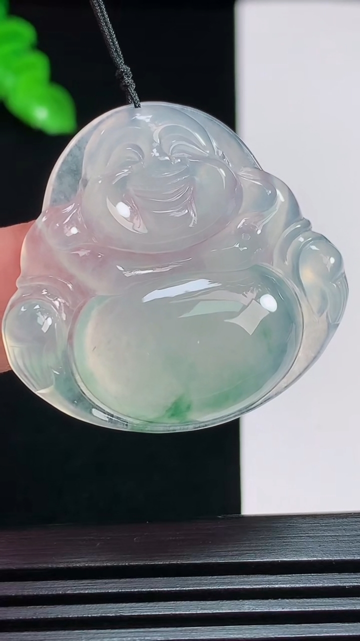 天然A货翡翠冰种飘花佛公吊坠，尺寸33.5-36-6 重量:10.63g
7月29日