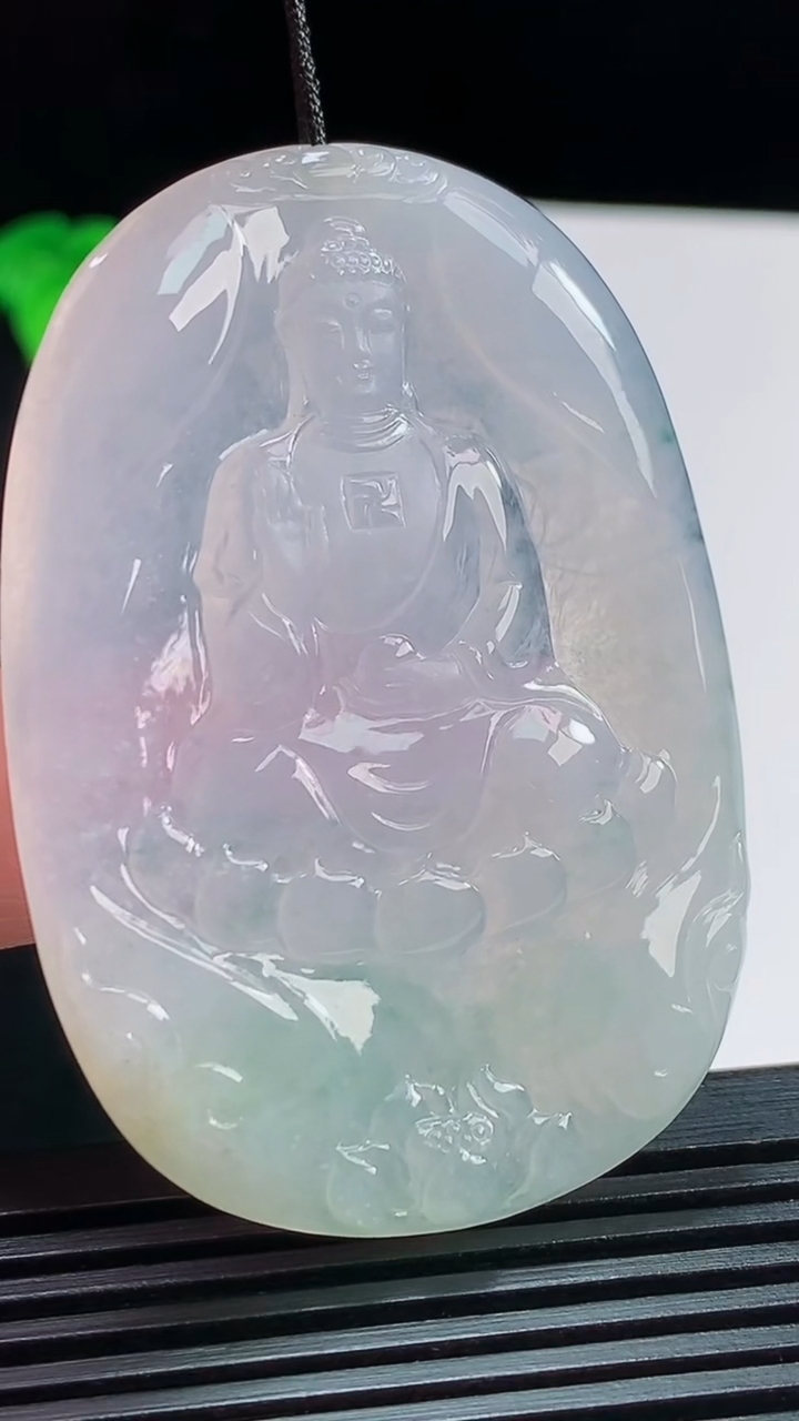 天然A货翡翠飘花阿弥陀佛吊坠，尺寸57-39-5 重量:24.89g
8月10日
