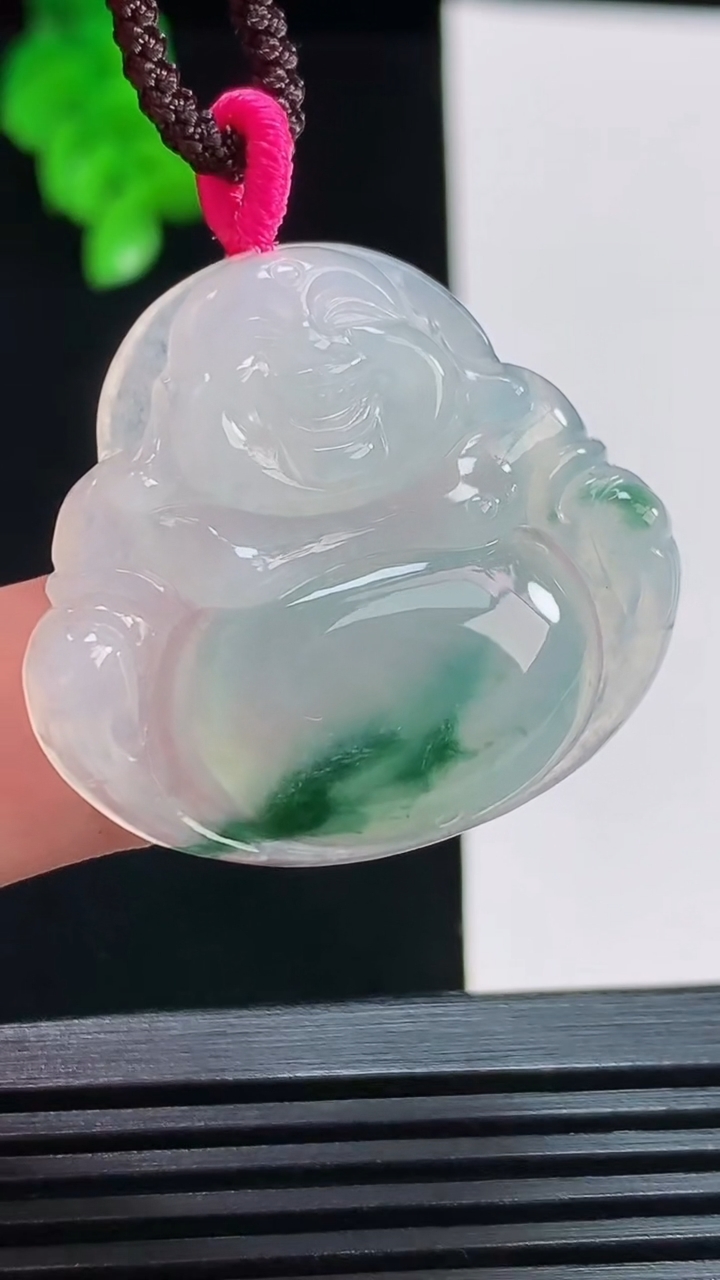 天然A货翡翠飘花佛公吊坠，尺寸30-34-5.6 重量:9.44g
8月10日