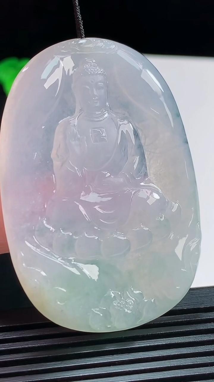 天然A货翡翠飘花阿弥陀佛吊坠，尺寸57-39-5 重量:24.89g
8月10日