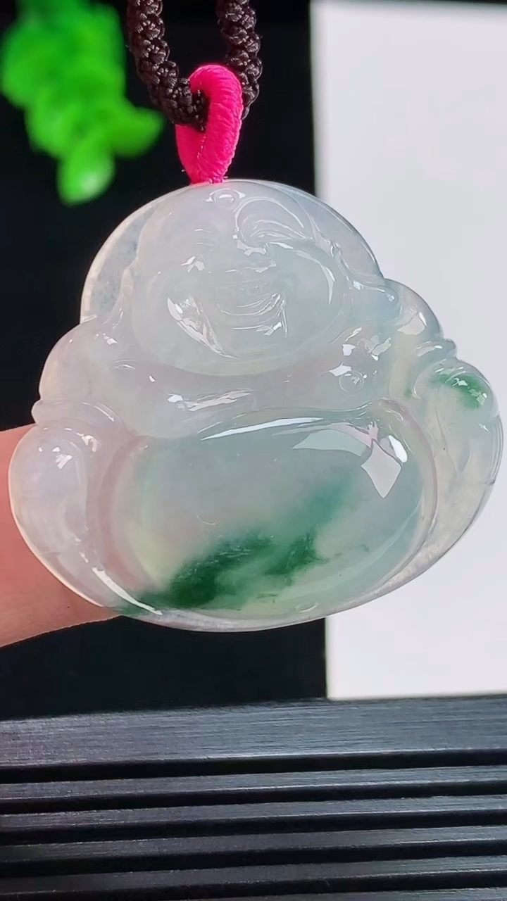 天然A货翡翠飘花佛公吊坠，尺寸30-34-5.6 重量:9.44g
8月10日