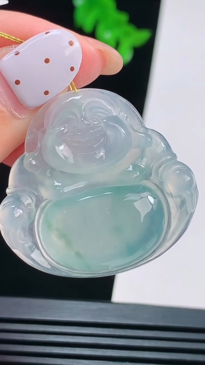 天然A货翡翠种飘花佛公吊坠，尺寸33.5-35.6-5.2 重量:9.43g
8月22日