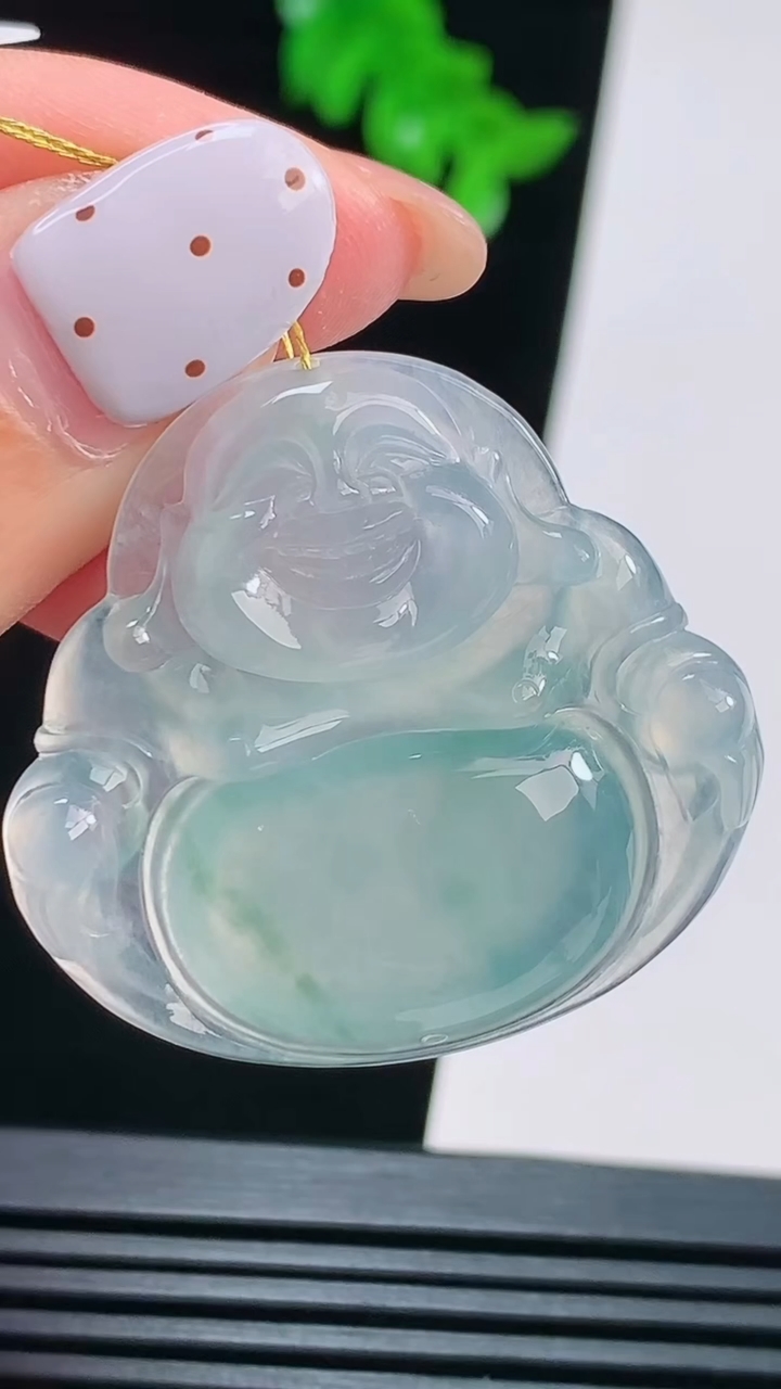 天然A货翡翠种飘花佛公吊坠，尺寸33.5-35.6-5.2 重量:9.43g
8月22日