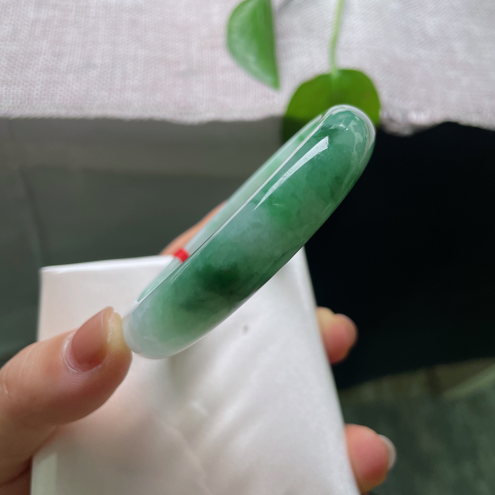 55.7/12.4/7.5飘绿正圈，皮纹，56983