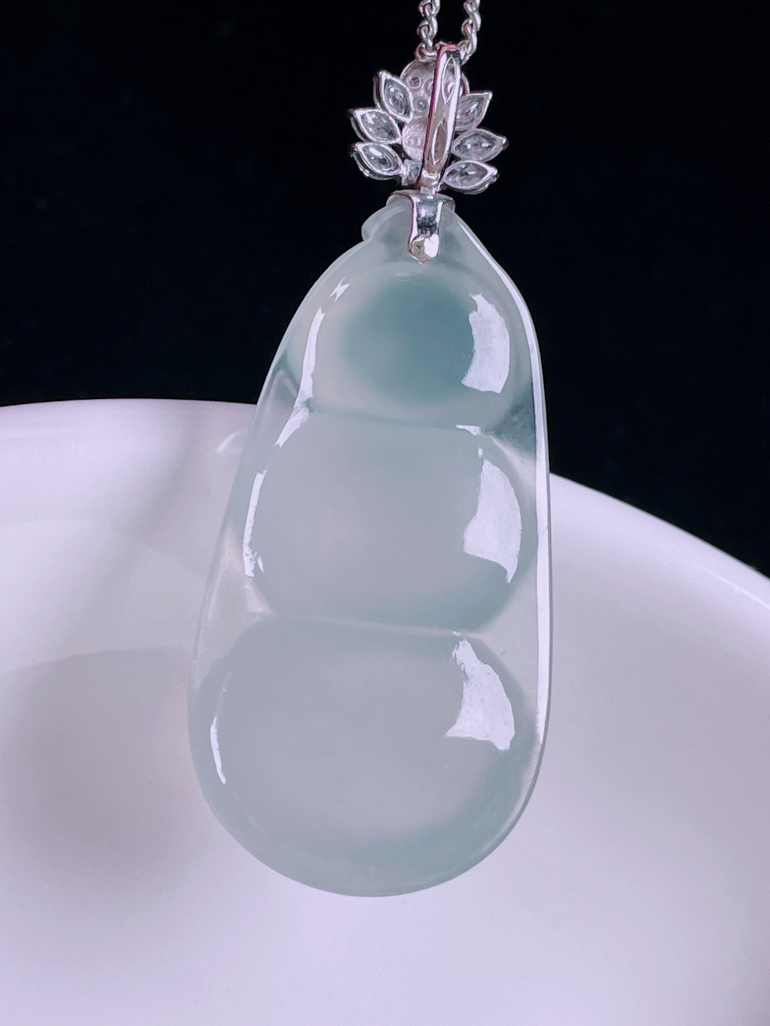 白冰福豆，老种起光，细底通透，尺寸：39裸石31.5/16.8/6.2mm0808