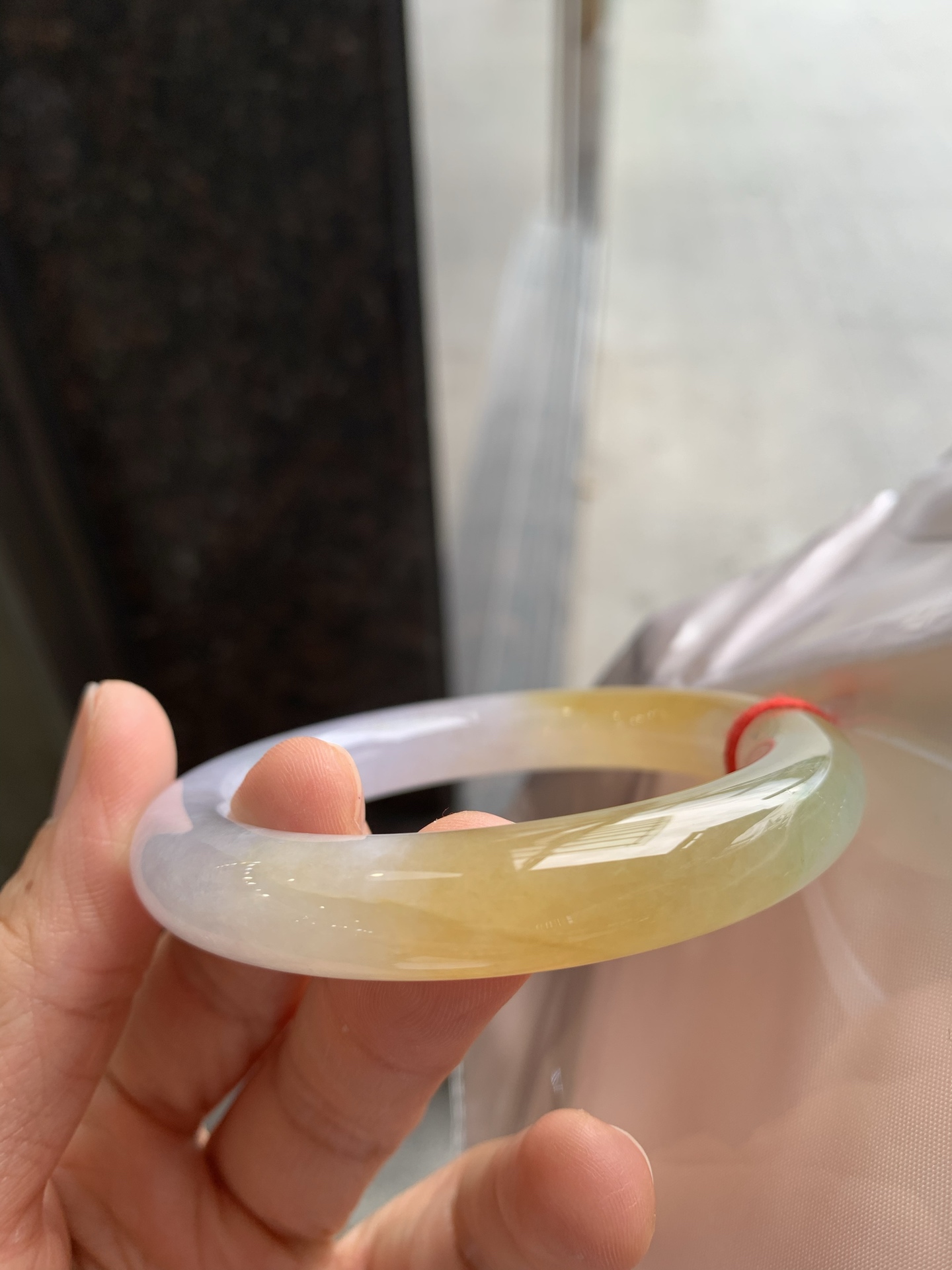 圆条冰黄翡 有纹裂 尺寸：54.2/10.6 色好
