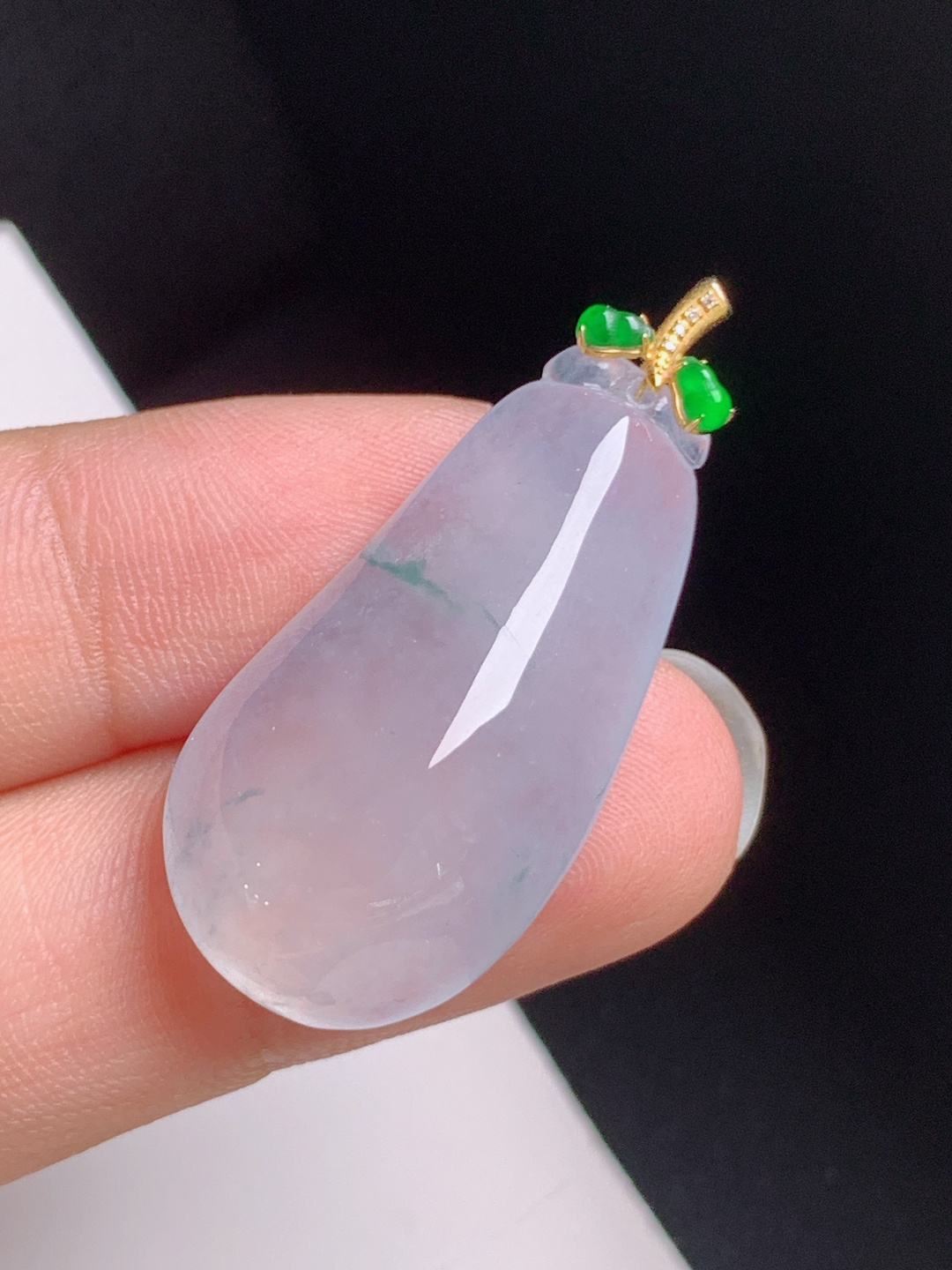 冰种飘花福瓜吊坠，紫韵淡雅，形体饱满，水润莹亮，多子多福，裸石31.6-15.8-8.135.8，082508