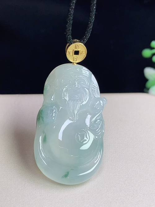 18k金镶冰飘花财神爷，无裂，尺寸34.5-19.3-5.7mm，j03ar