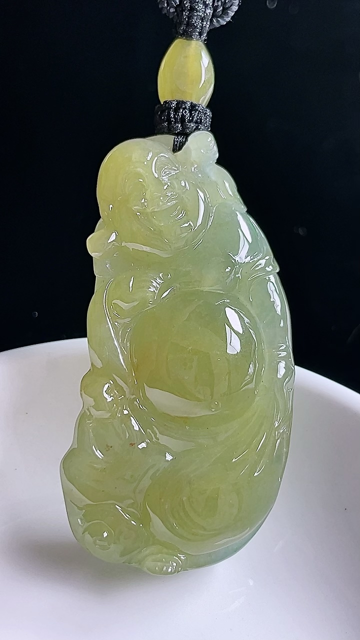 冰黄翡布袋佛
色泽金黄，细腻胶润
完美 尺寸56.6/26.9/12.4，