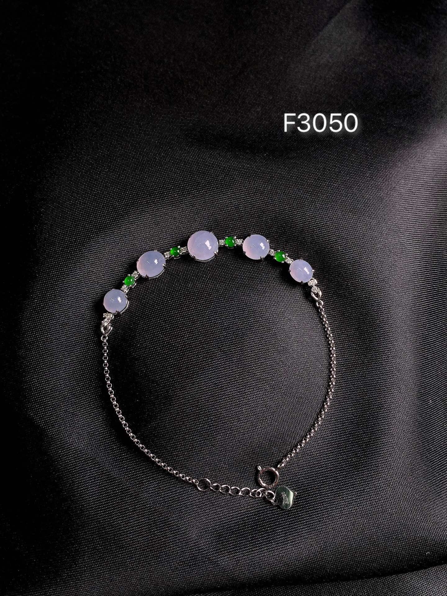 18k紫蛋面手链,中间裸石7.4-7.4-3.7,总长度185,F3050