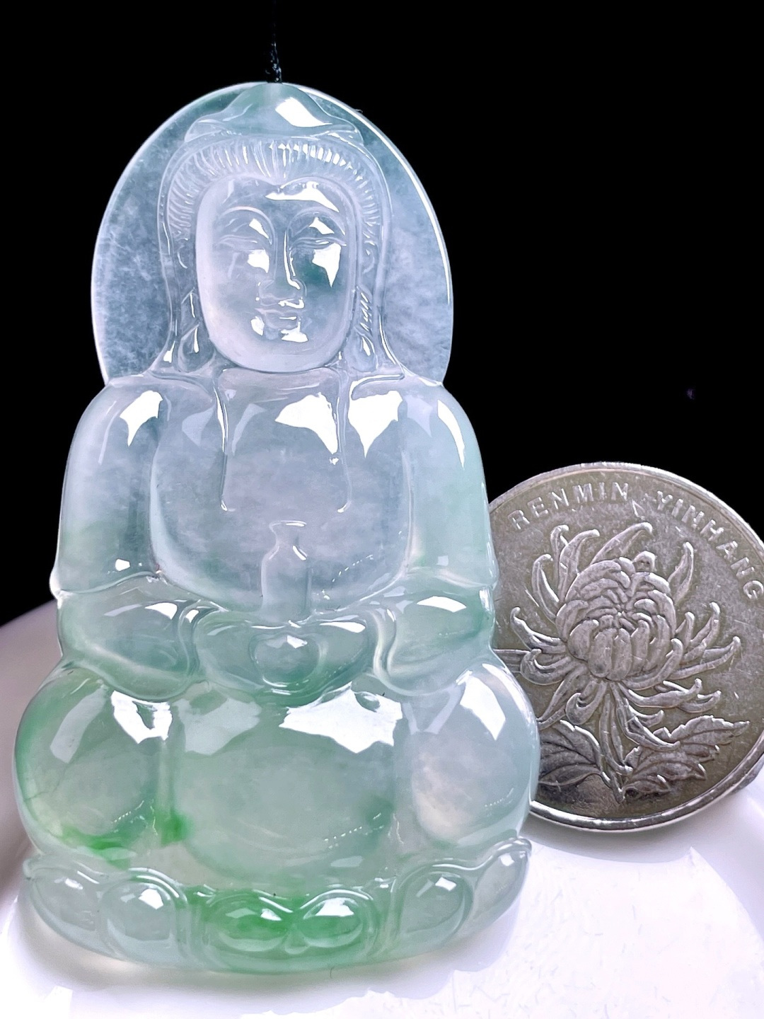 冰种绿花观音，花色灵动，油润冰胶