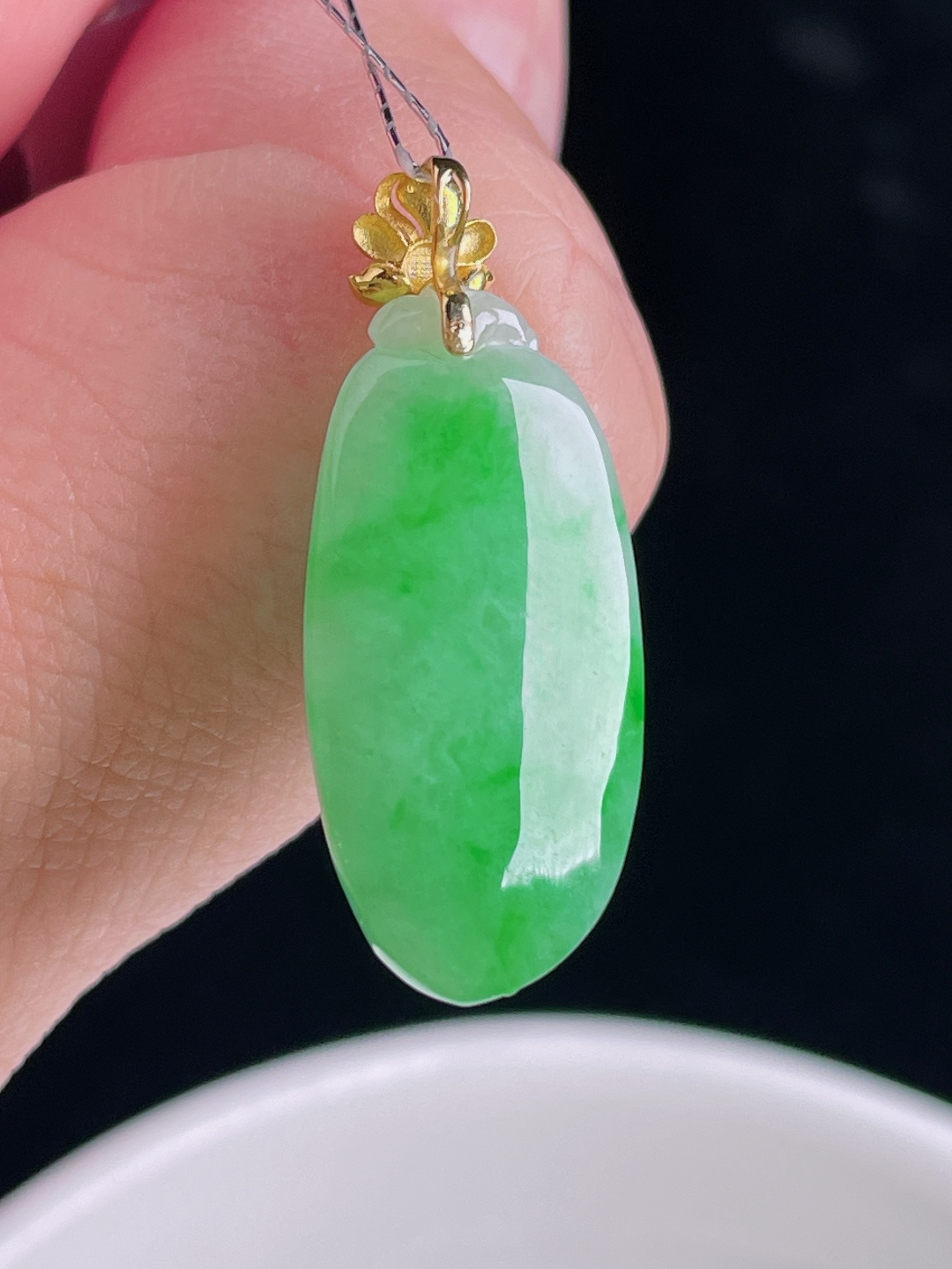 辣绿福瓜，18k镶嵌，老种起光，细底通透，尺寸：28裸石23.5/12/6.4mm0910