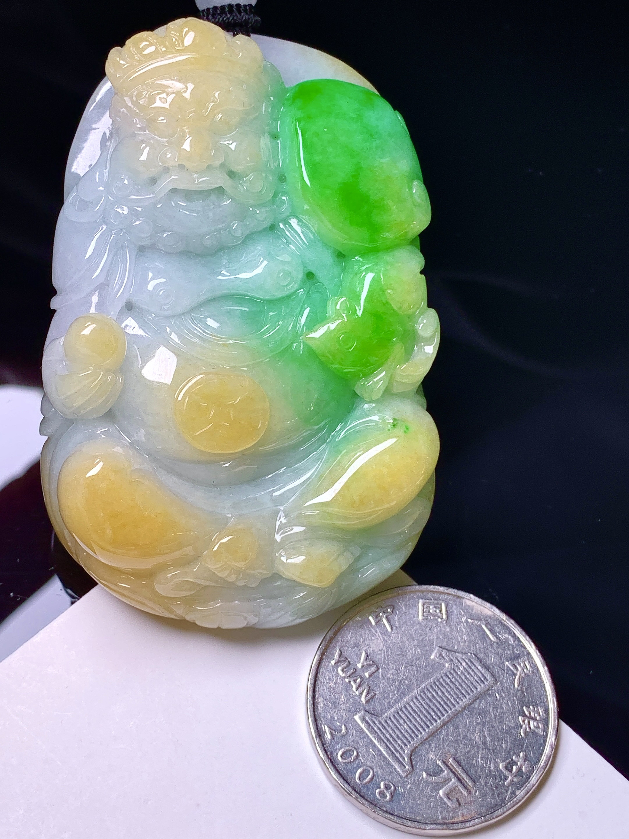 飘黄绿翡财神爷吊坠 玉质细腻 色泽艳丽清新 水润亮眼 整体尺寸60.8*38.8*15.8 w1