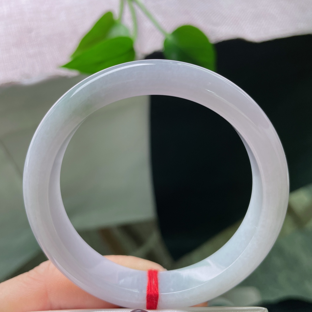 55.5/11.8/7.9，粉紫正圈，肉质细腻干净，像被水晕开的蜜与雾，柔软得让人失去语言。无裂，s