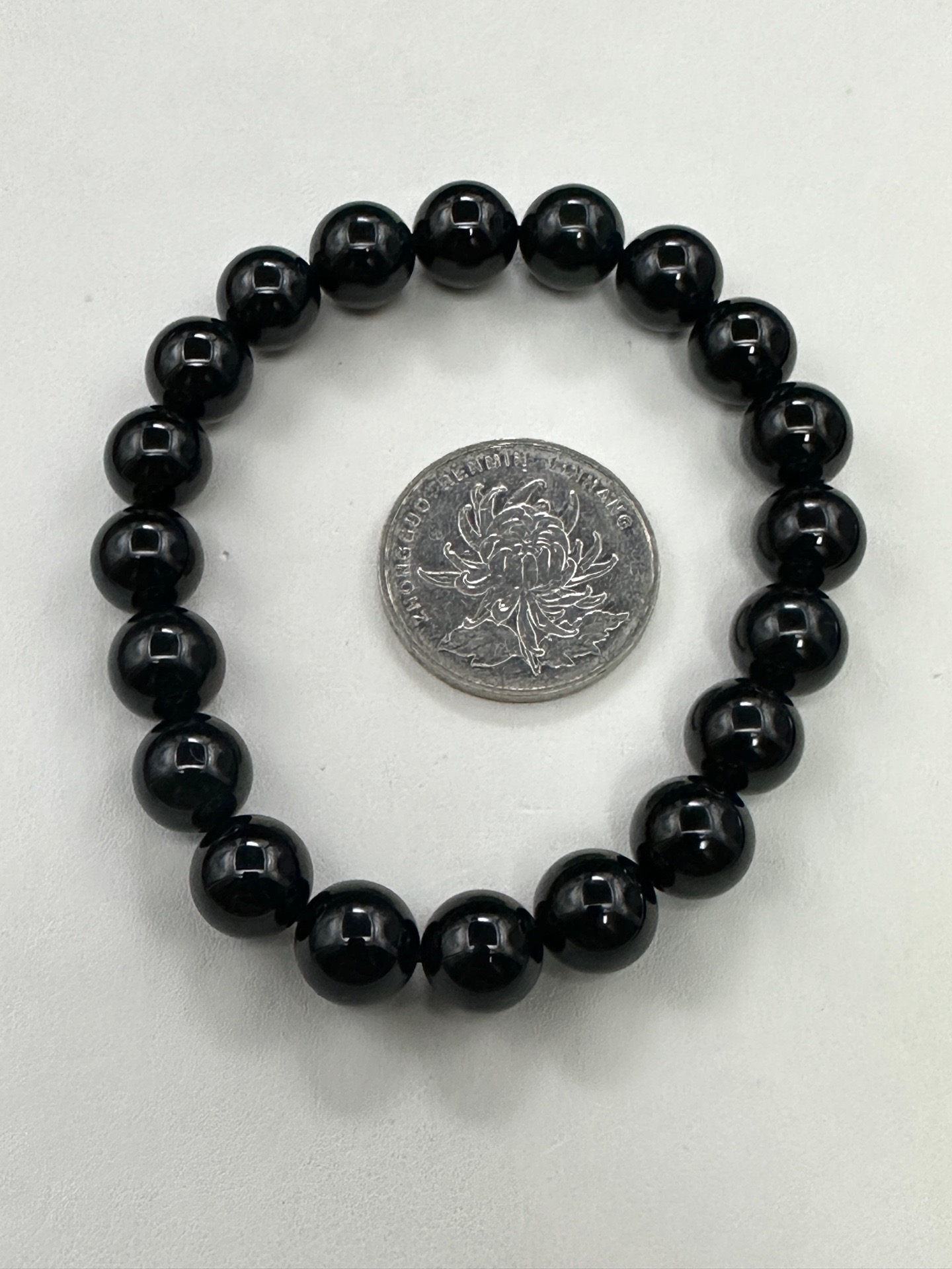 墨翠手串10mm 老坑冰种 黑度极黑 灯照全透 呈帝王绿 种老起光 底极细腻 圆润饱满