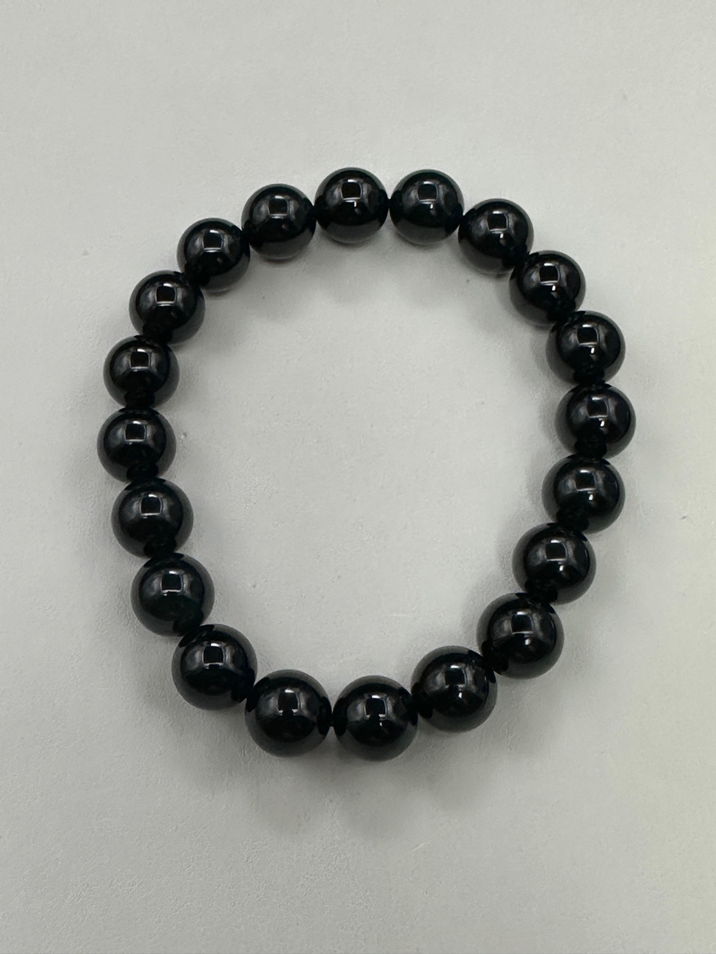 墨翠手串10mm 老坑冰种 黑度极黑 灯照全透 呈帝王绿 种老起光 底极细腻 圆润饱满