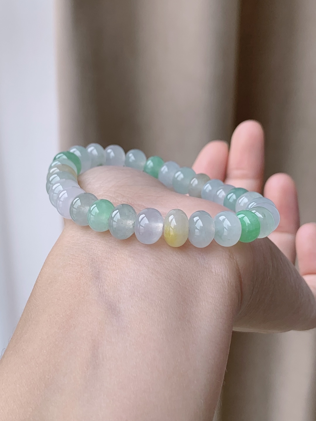 【珠子】冰多宝手串算盘珠珠子手串 【说明】缅甸 性比高 【尺寸】9-6mm 【重量】26.9克